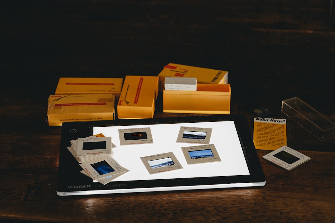 white ipad on brown carton box